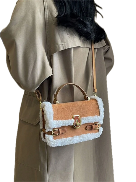 Luxury matching crossbody handbag with plush stitching and advanced texture